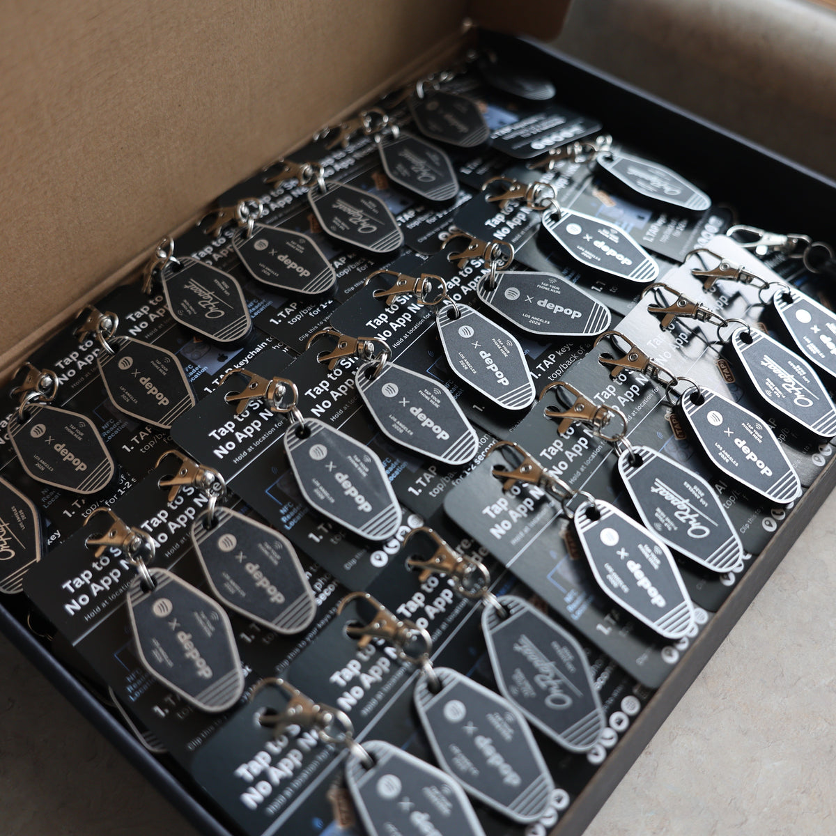 Finished Depop x Spotify Custom NFC Keychains for the On Repeat Event