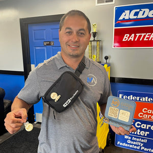 Person holding the tapkeychains starter bundle and tapstand testimonial